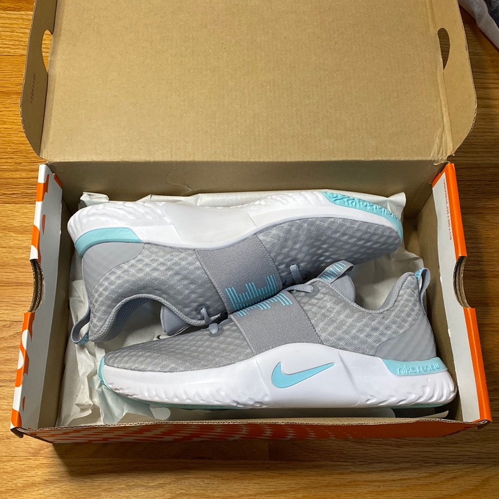 Brand New Gray Nike Renew Sneakers with blue details